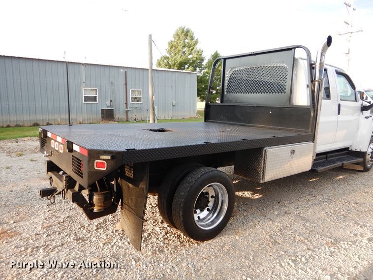 image for item FK9768 2004 GMC C4500 Crew Cab flatbed truck