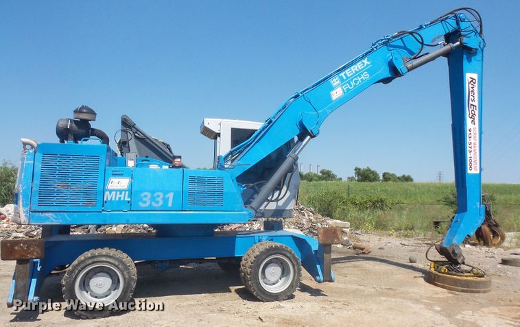 image for item DE2395 2005 Fuchs MHL 331 rubber tire excavator