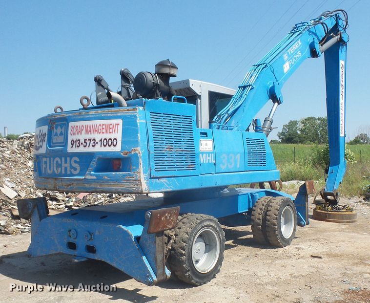 image for item DE2395 2005 Fuchs MHL 331 rubber tire excavator