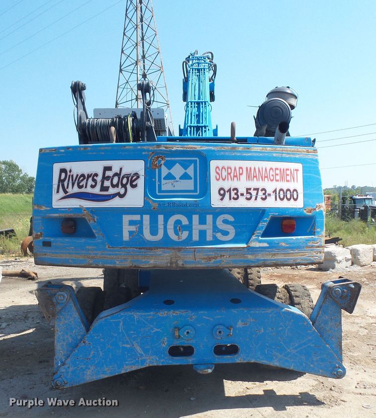 image for item DE2395 2005 Fuchs MHL 331 rubber tire excavator