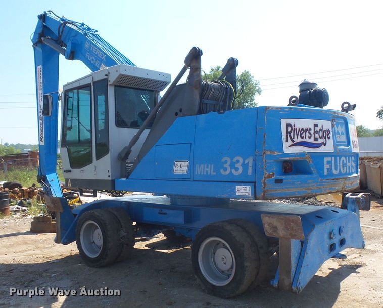 image for item DE2395 2005 Fuchs MHL 331 rubber tire excavator