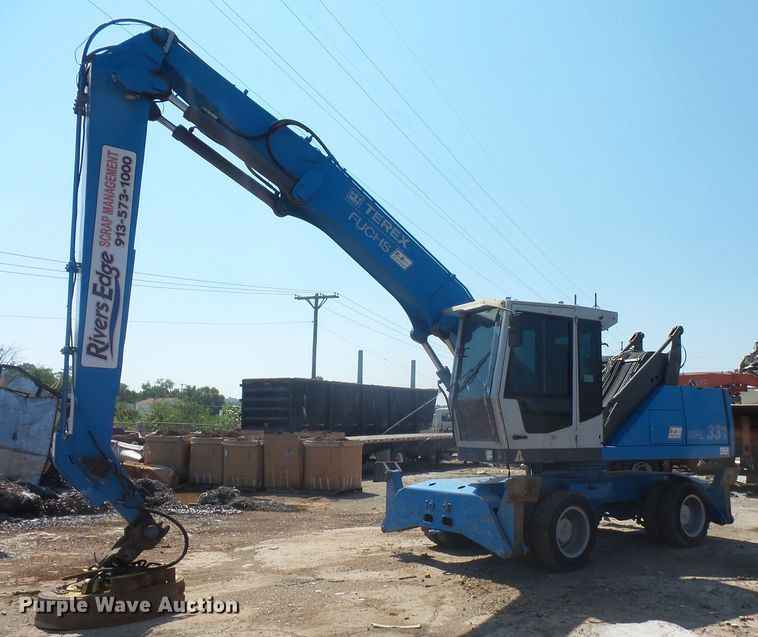 image for item DE2395 2005 Fuchs MHL 331 rubber tire excavator