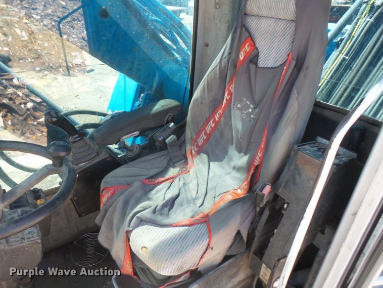 image for item DE2395 2005 Fuchs MHL 331 rubber tire excavator