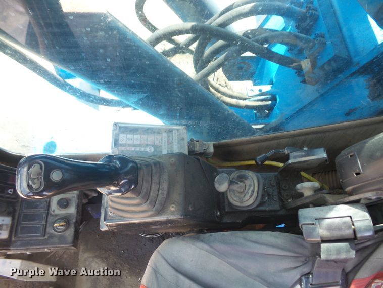 image for item DE2395 2005 Fuchs MHL 331 rubber tire excavator