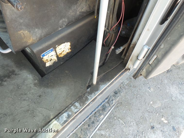 image for item DE2395 2005 Fuchs MHL 331 rubber tire excavator