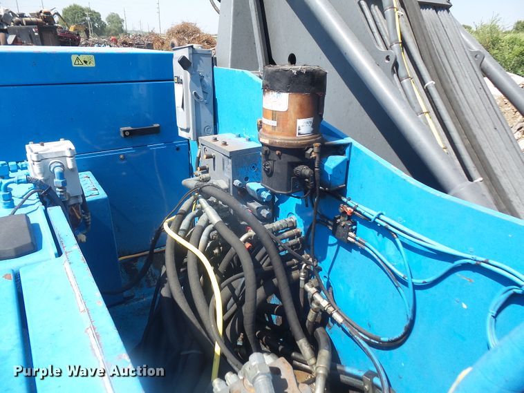 image for item DE2395 2005 Fuchs MHL 331 rubber tire excavator