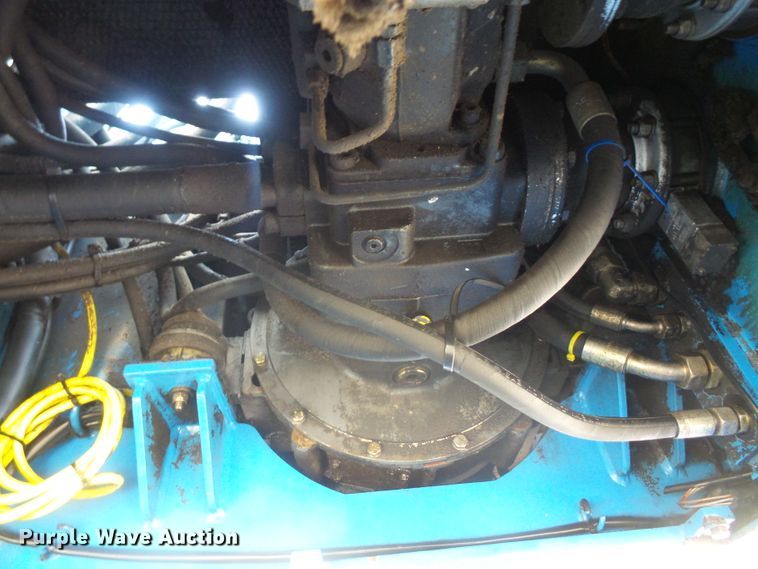 image for item DE2395 2005 Fuchs MHL 331 rubber tire excavator