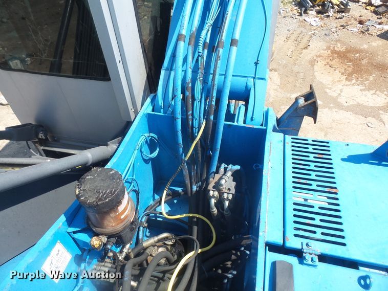 image for item DE2395 2005 Fuchs MHL 331 rubber tire excavator