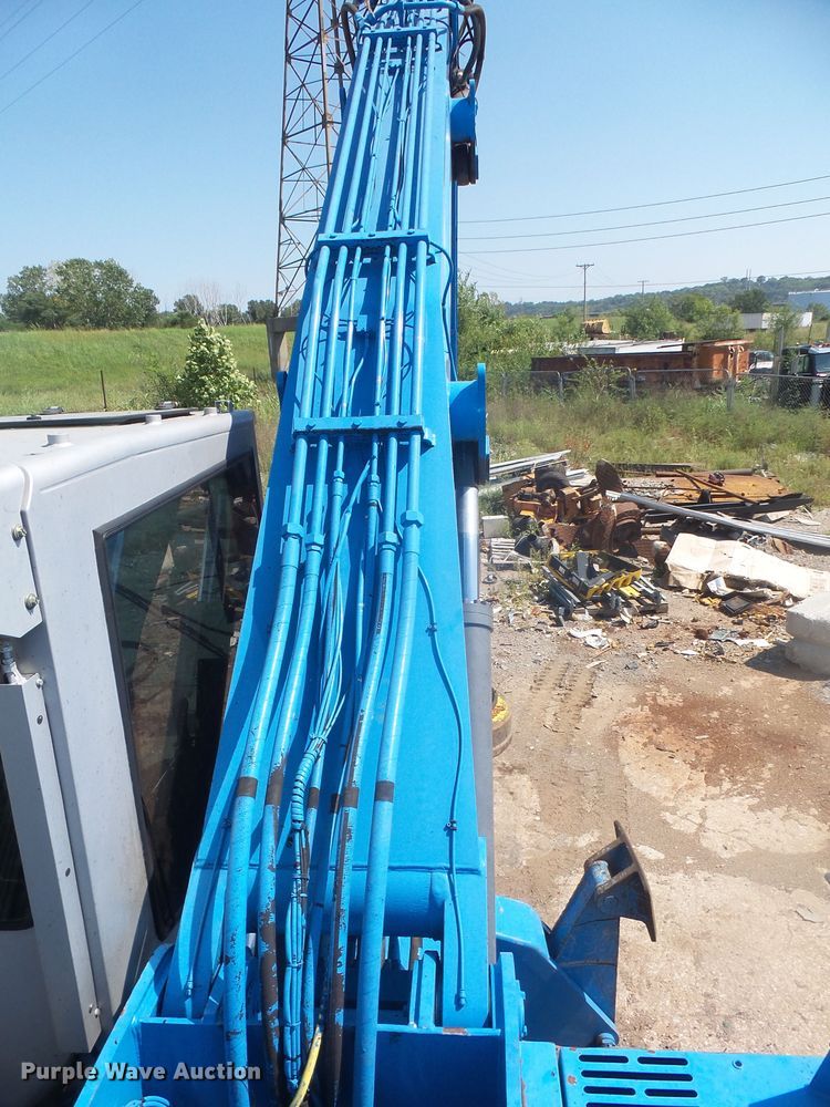 image for item DE2395 2005 Fuchs MHL 331 rubber tire excavator