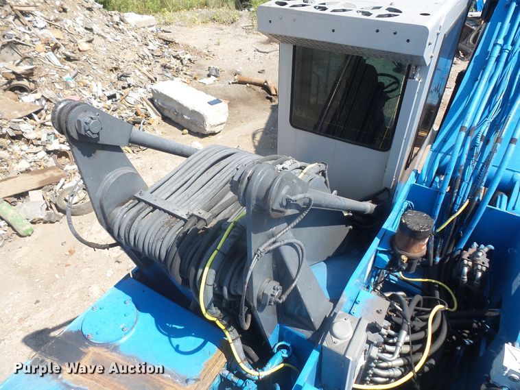 image for item DE2395 2005 Fuchs MHL 331 rubber tire excavator