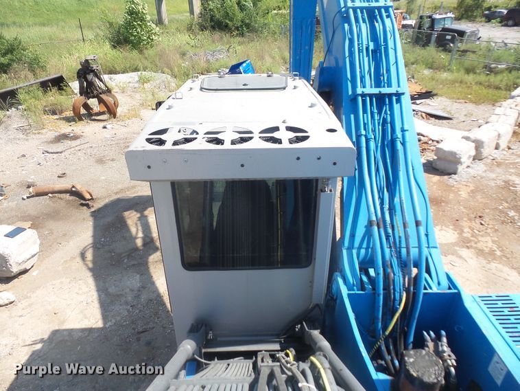 image for item DE2395 2005 Fuchs MHL 331 rubber tire excavator