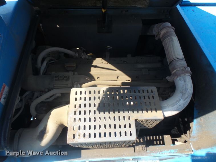 image for item DE2395 2005 Fuchs MHL 331 rubber tire excavator