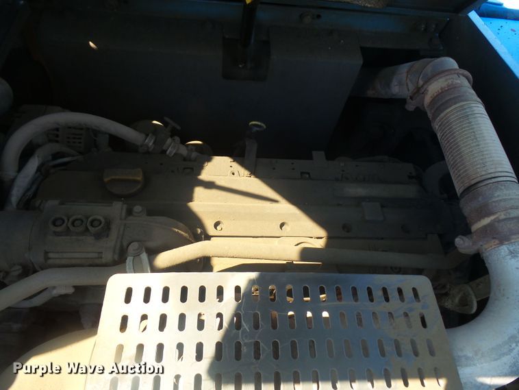 image for item DE2395 2005 Fuchs MHL 331 rubber tire excavator