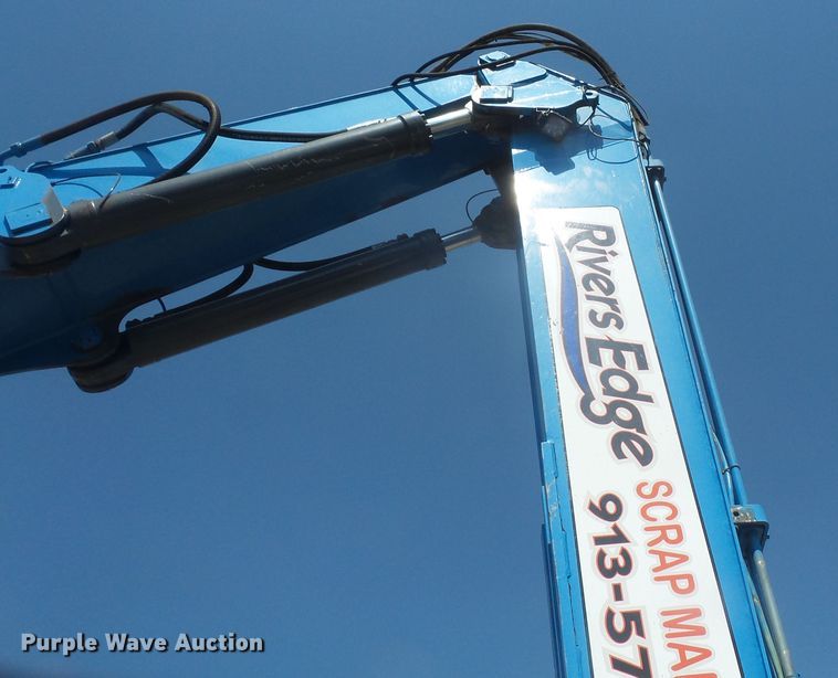 image for item DE2395 2005 Fuchs MHL 331 rubber tire excavator