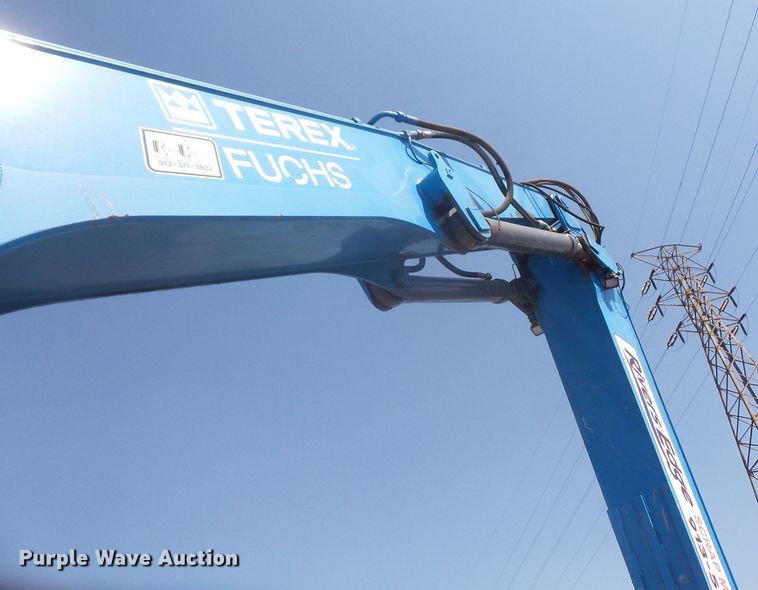 image for item DE2395 2005 Fuchs MHL 331 rubber tire excavator