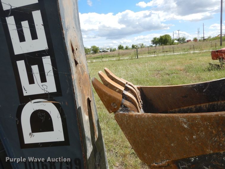 image for item DF2582 2013 John Deere 310K backhoe