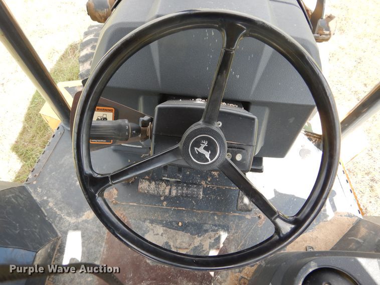 image for item DF2582 2013 John Deere 310K backhoe