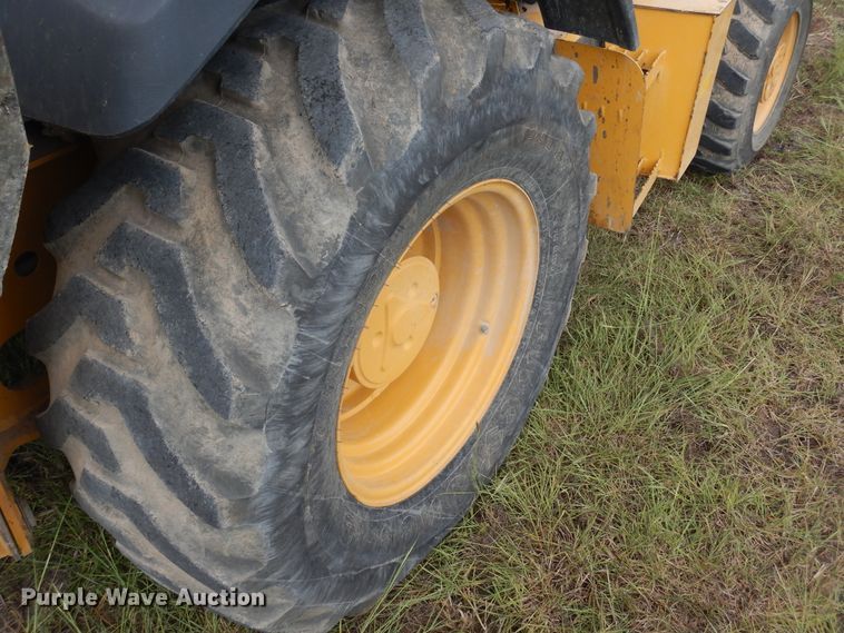 image for item DF2582 2013 John Deere 310K backhoe