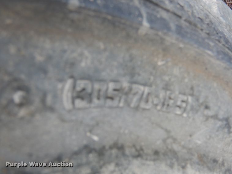 image for item DF2582 2013 John Deere 310K backhoe