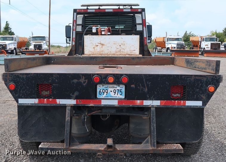 image for item DG4133 2003 International 4400 Crew Cab flatbed truck