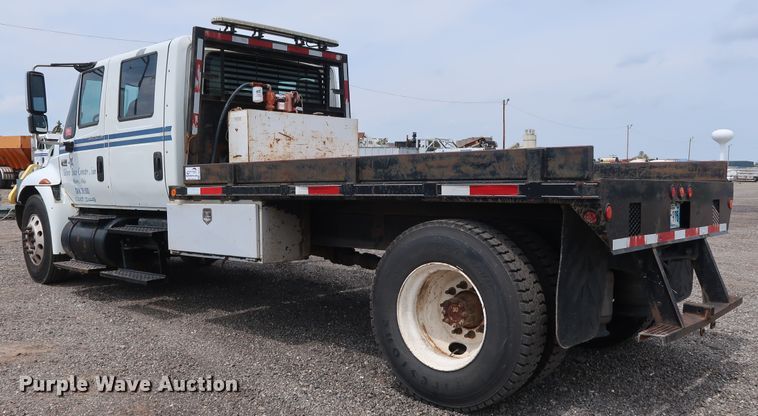 image for item DG4133 2003 International 4400 Crew Cab flatbed truck