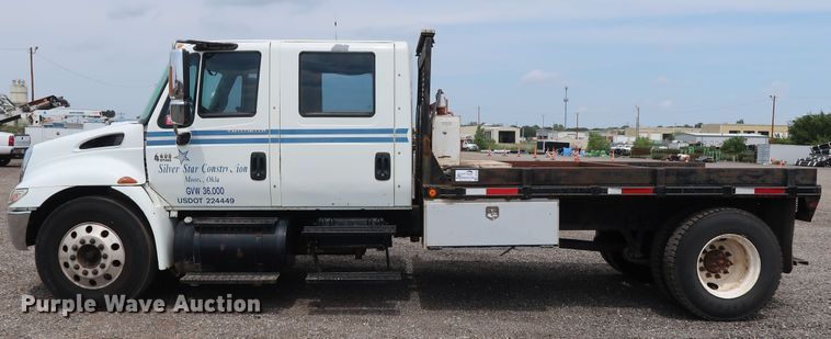 image for item DG4133 2003 International 4400 Crew Cab flatbed truck