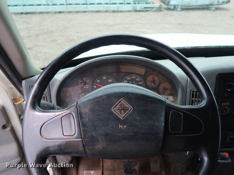 image for item DG4133 2003 International 4400 Crew Cab flatbed truck