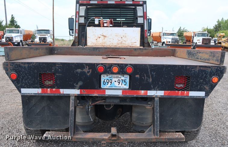 image for item DG4133 2003 International 4400 Crew Cab flatbed truck