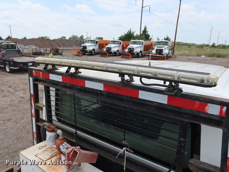 image for item DG4133 2003 International 4400 Crew Cab flatbed truck