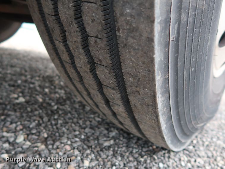 image for item DG4133 2003 International 4400 Crew Cab flatbed truck