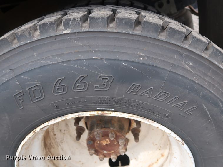 image for item DG4133 2003 International 4400 Crew Cab flatbed truck