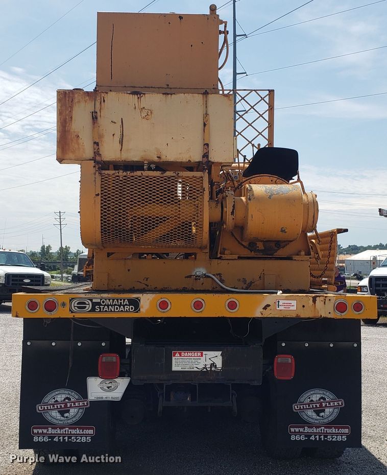 image for item ET9815 1995 Ford FT900 cable puller truck