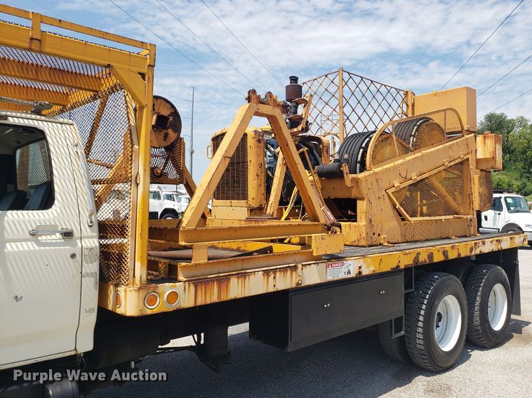 image for item ET9815 1995 Ford FT900 cable puller truck
