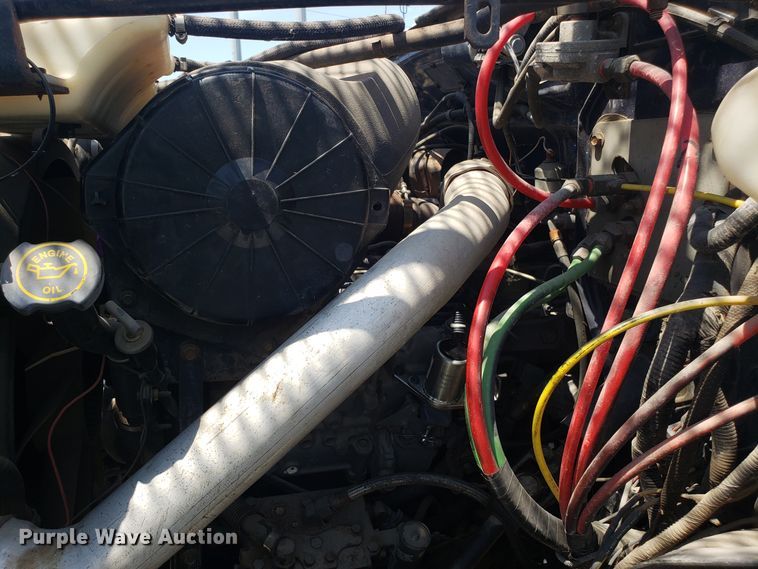 image for item ET9815 1995 Ford FT900 cable puller truck