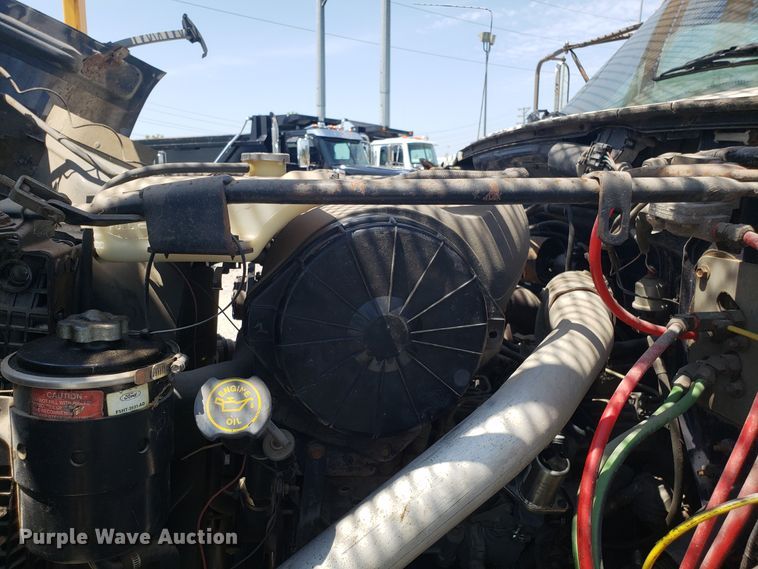 image for item ET9815 1995 Ford FT900 cable puller truck