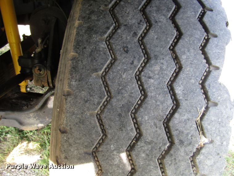 image for item DE2399 2003 Sterling L-Line flatbed truck