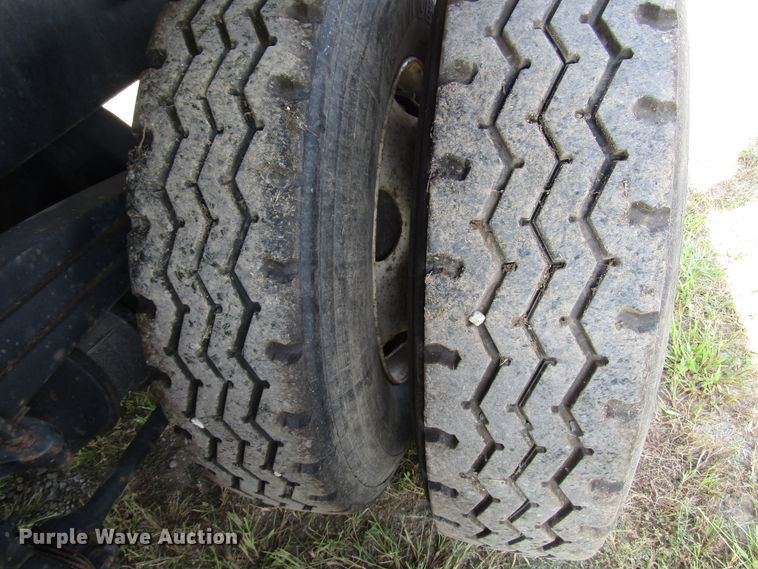 image for item DE2399 2003 Sterling L-Line flatbed truck