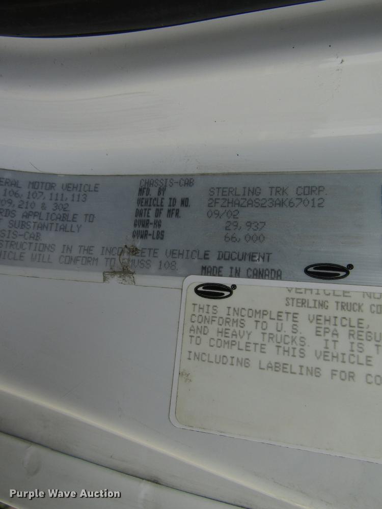 image for item DE2399 2003 Sterling L-Line flatbed truck