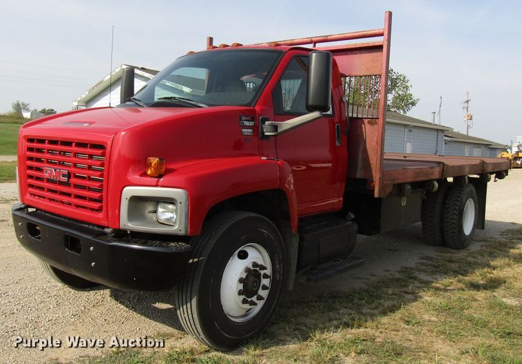 image for item DE2401 2006 GMC C7500 flat dump bed truck