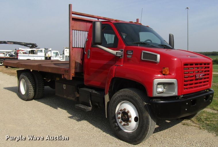 image for item DE2401 2006 GMC C7500 flat dump bed truck
