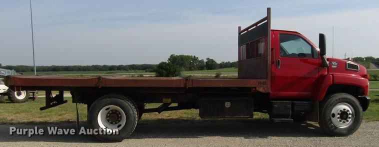 image for item DE2401 2006 GMC C7500 flat dump bed truck