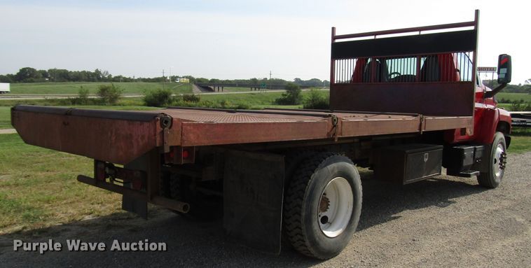 image for item DE2401 2006 GMC C7500 flat dump bed truck