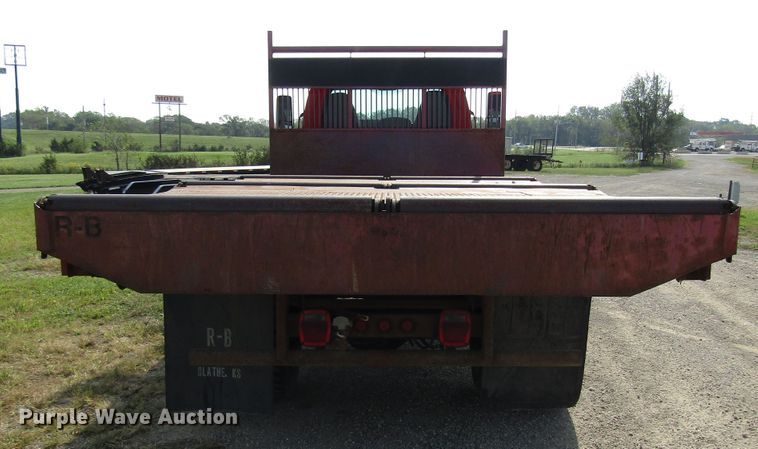 image for item DE2401 2006 GMC C7500 flat dump bed truck