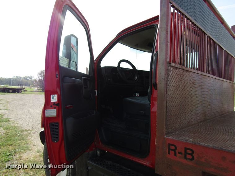 image for item DE2401 2006 GMC C7500 flat dump bed truck