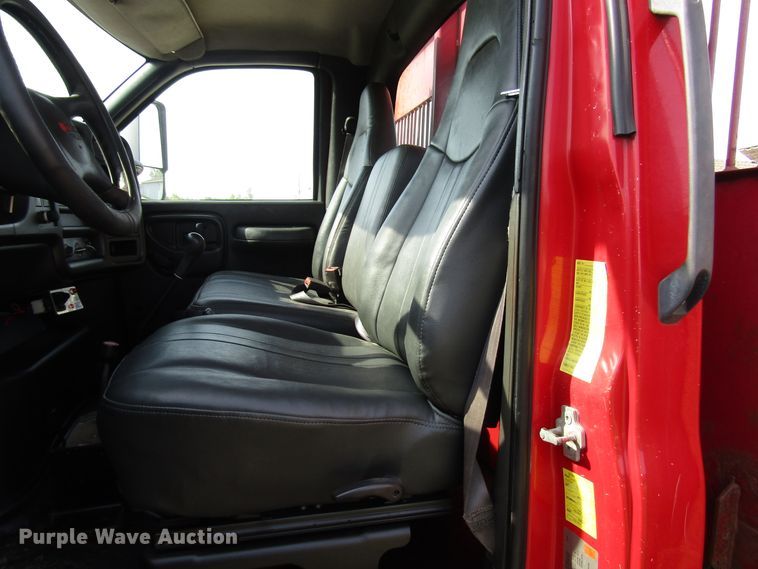 image for item DE2401 2006 GMC C7500 flat dump bed truck