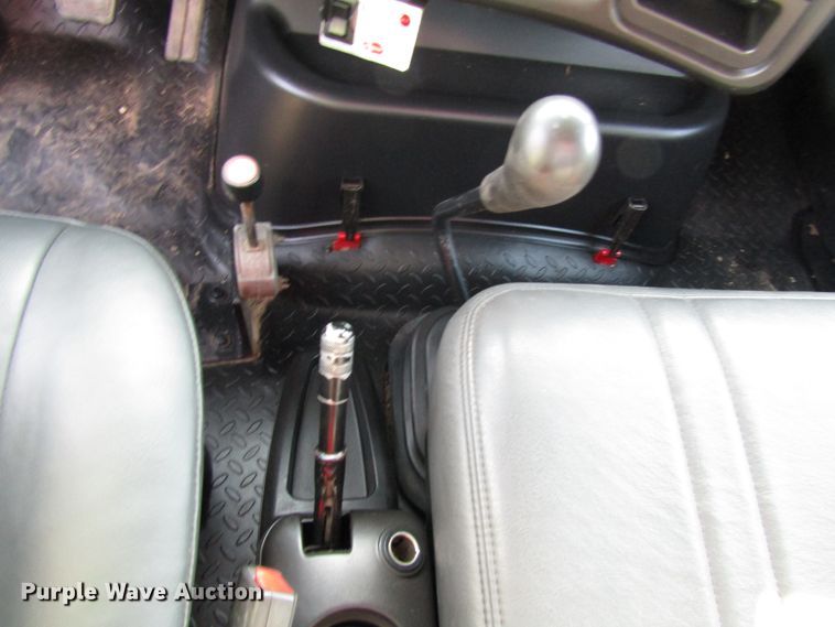 image for item DE2401 2006 GMC C7500 flat dump bed truck