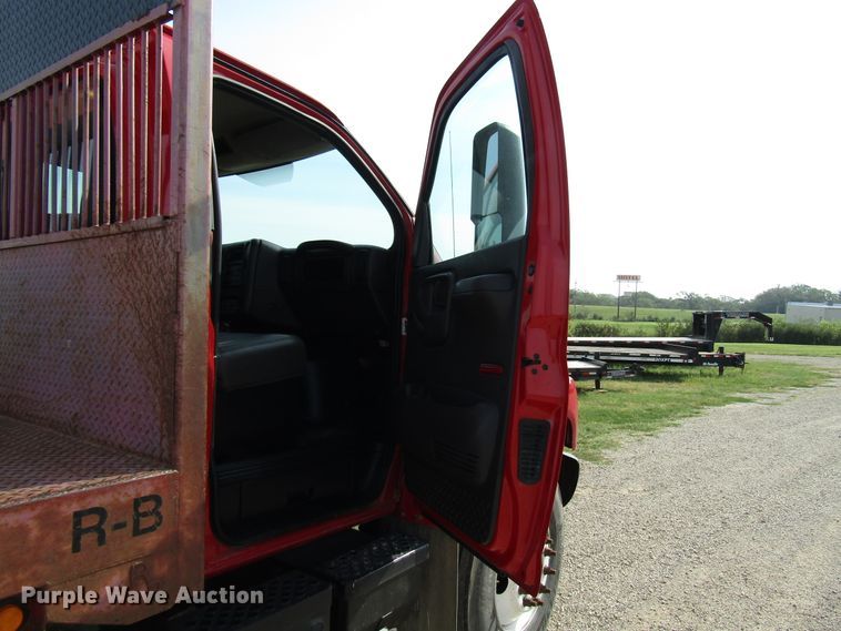 image for item DE2401 2006 GMC C7500 flat dump bed truck