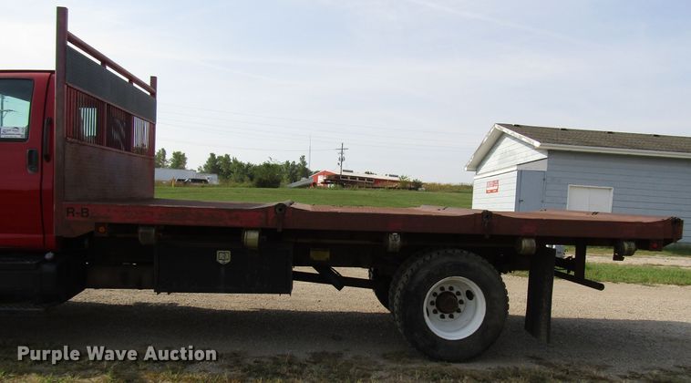 image for item DE2401 2006 GMC C7500 flat dump bed truck