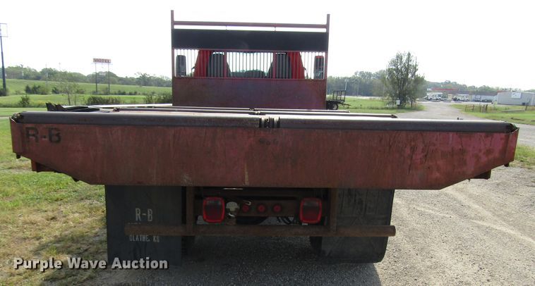 image for item DE2401 2006 GMC C7500 flat dump bed truck