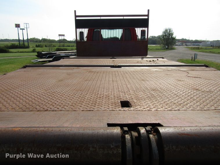 image for item DE2401 2006 GMC C7500 flat dump bed truck